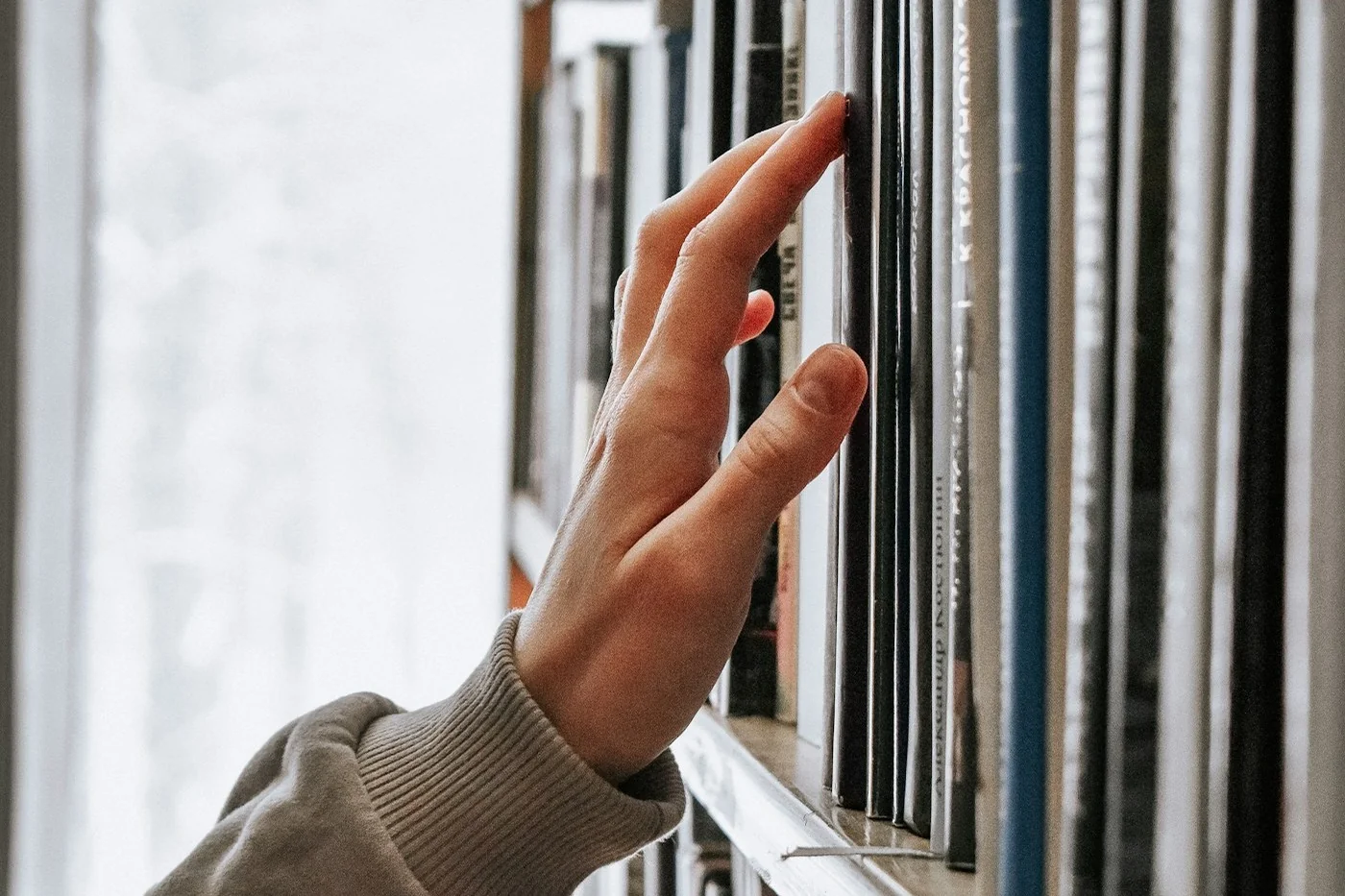 Selecting academic literature from a library shelf